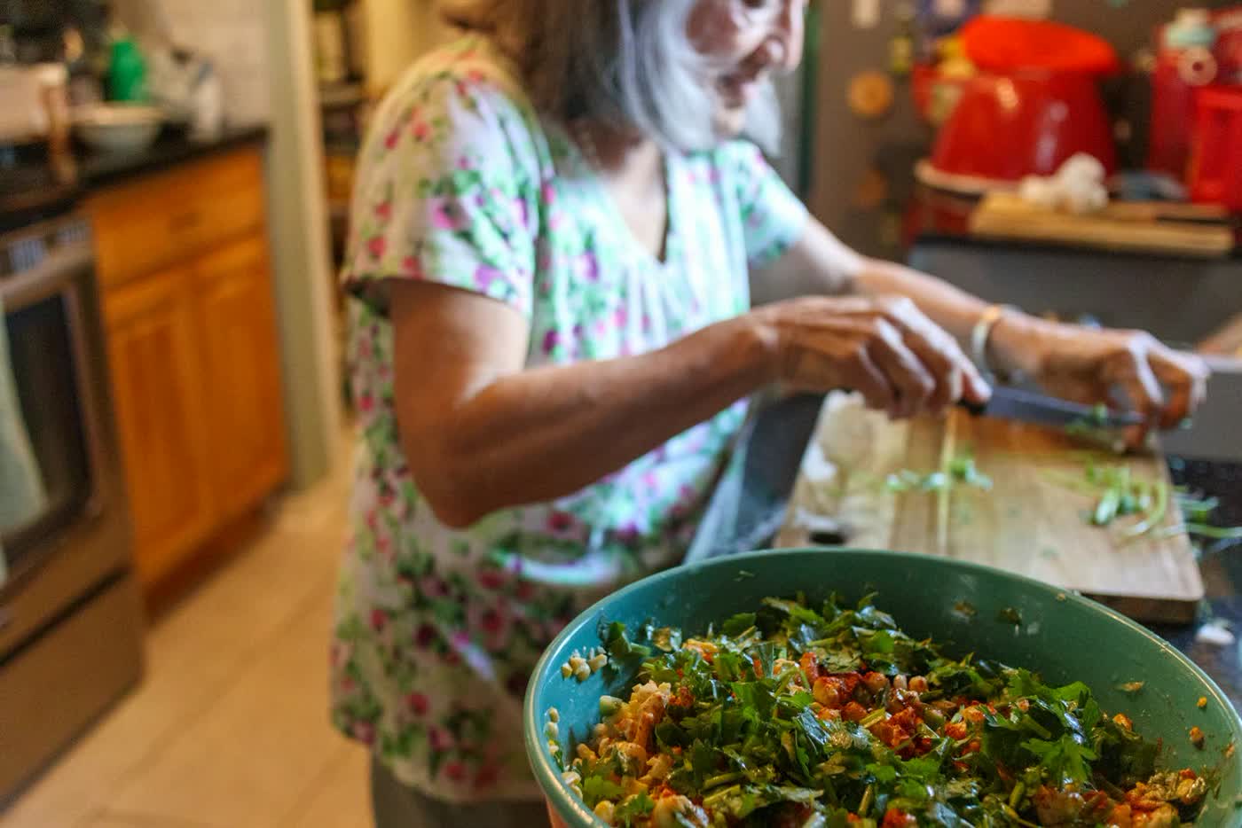 A cook at work in a house kitchen